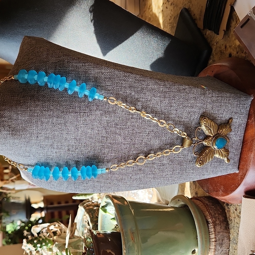 Butterfly pendant Necklace with blue sea glass and gold tone findings